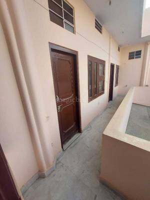 Bed in a 2 Bhk apartment Mahesh Nagar - Common area